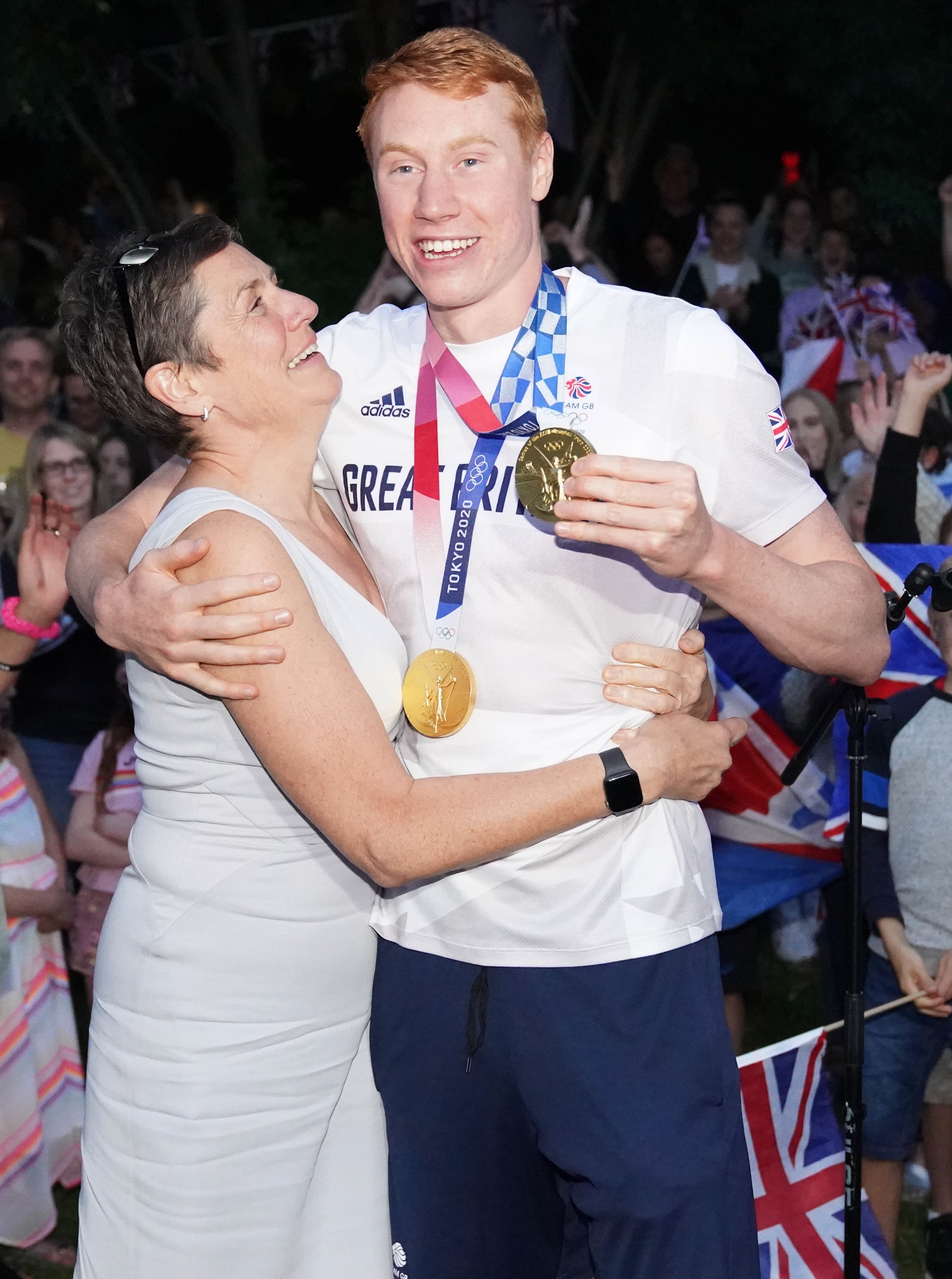 Dean pictured with his mum Jacquie Hughes at a welcome home event after the Olympics last summer (Jonathan Brady/PA)