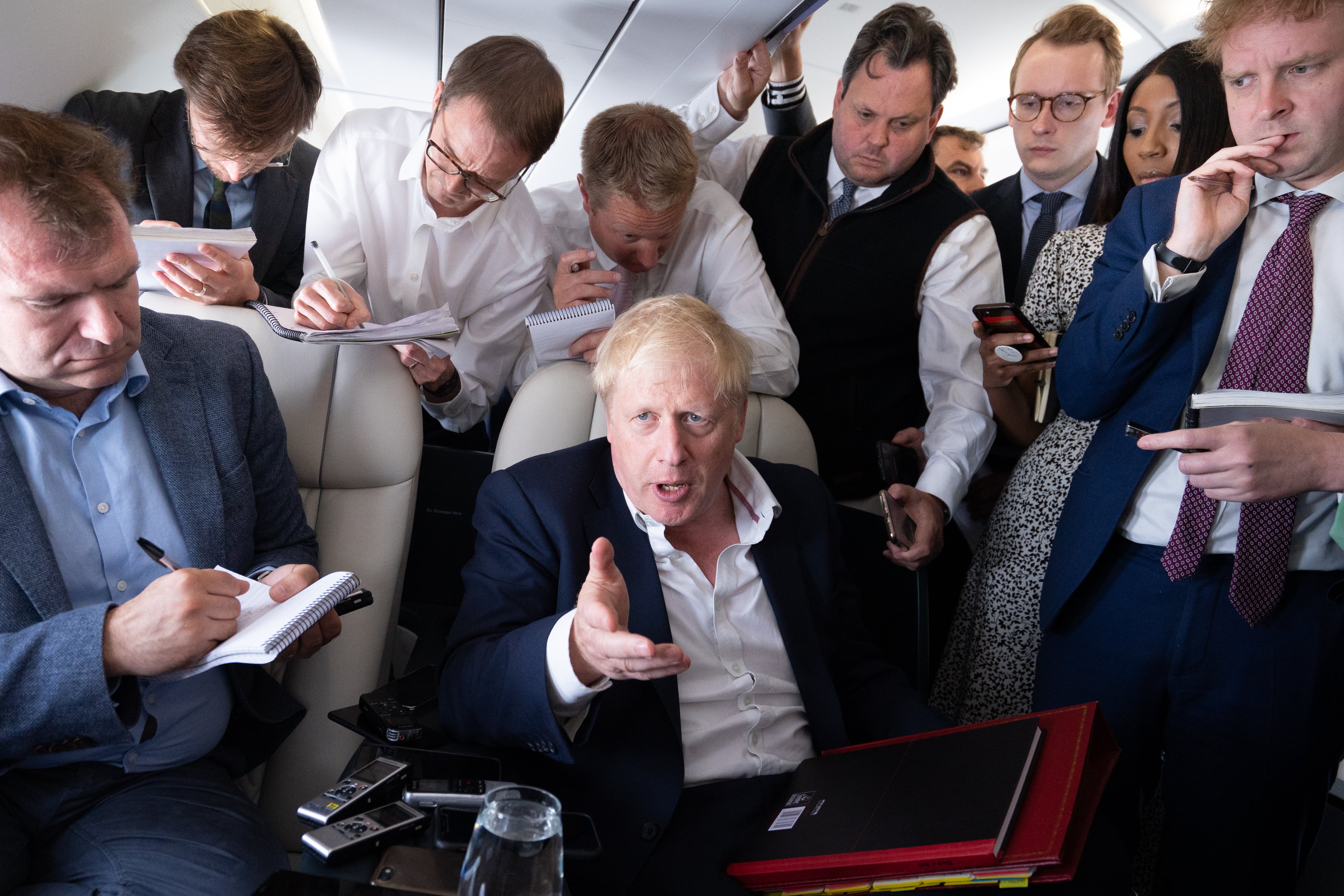 Prime Minister Boris Johnson talks to journalists while en route to the Nato summit in Madrid. (Stefan Rousseau/PA)