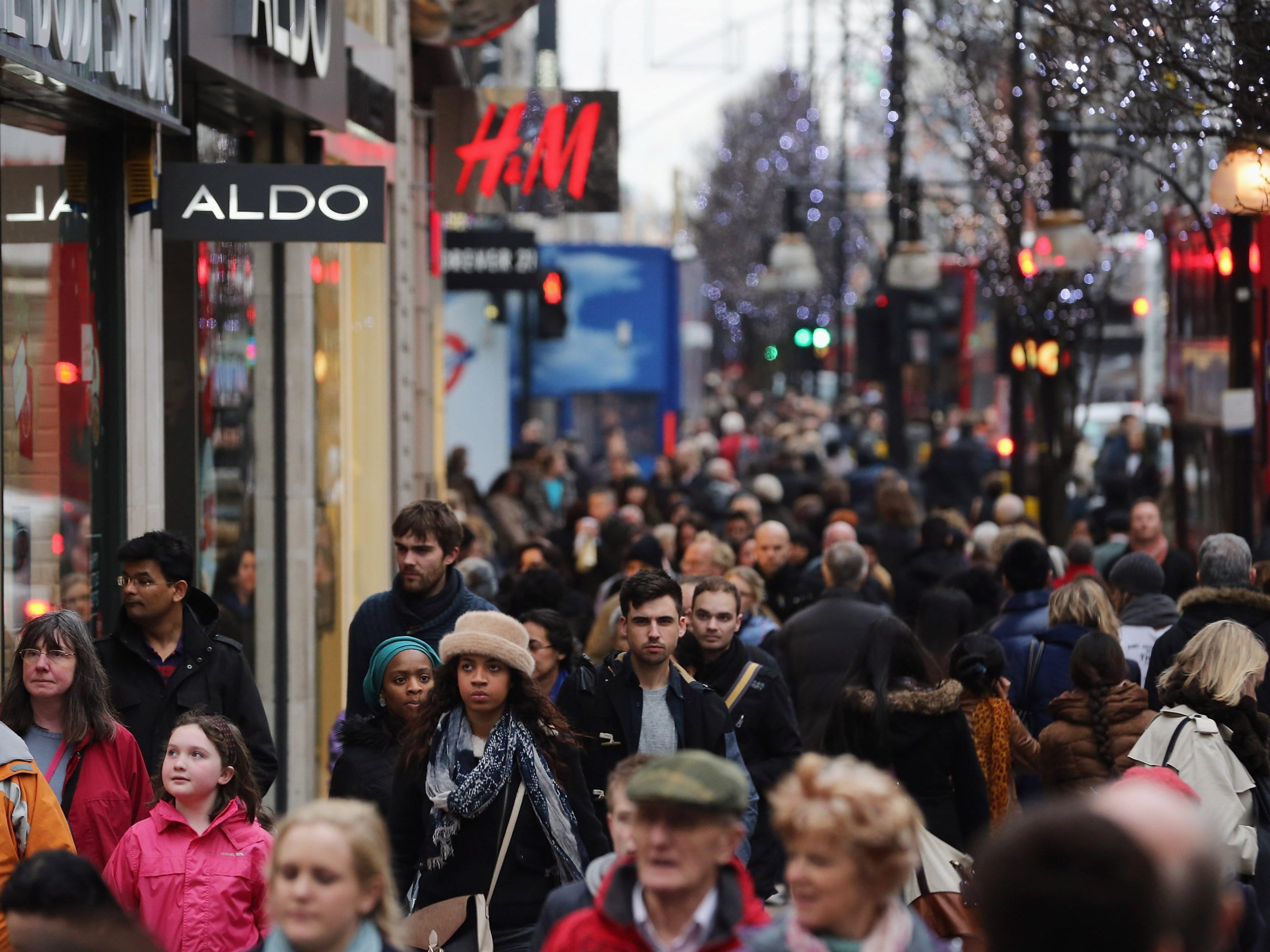 Shoppers make their way down Oxford Street in London