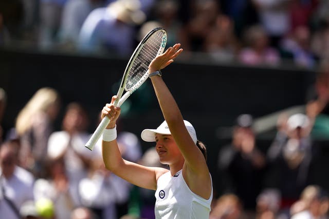 Iga Swiatek won her 36th match in a row with a first-round success at Wimbledon (John Walton/PA)