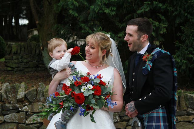 Kieran Wood, 34, and Claire Wood, 39, had a Help For Heroes themed wedding in April 2022 at Saddleworth Hotel in Oldham, Lancashire. (Caroline Meldrum/PA Real Life)