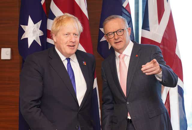 Prime Minister Boris Johnson meets Australian Prime Minister Anthony Albanese during the Nato summit in Madrid (PA)