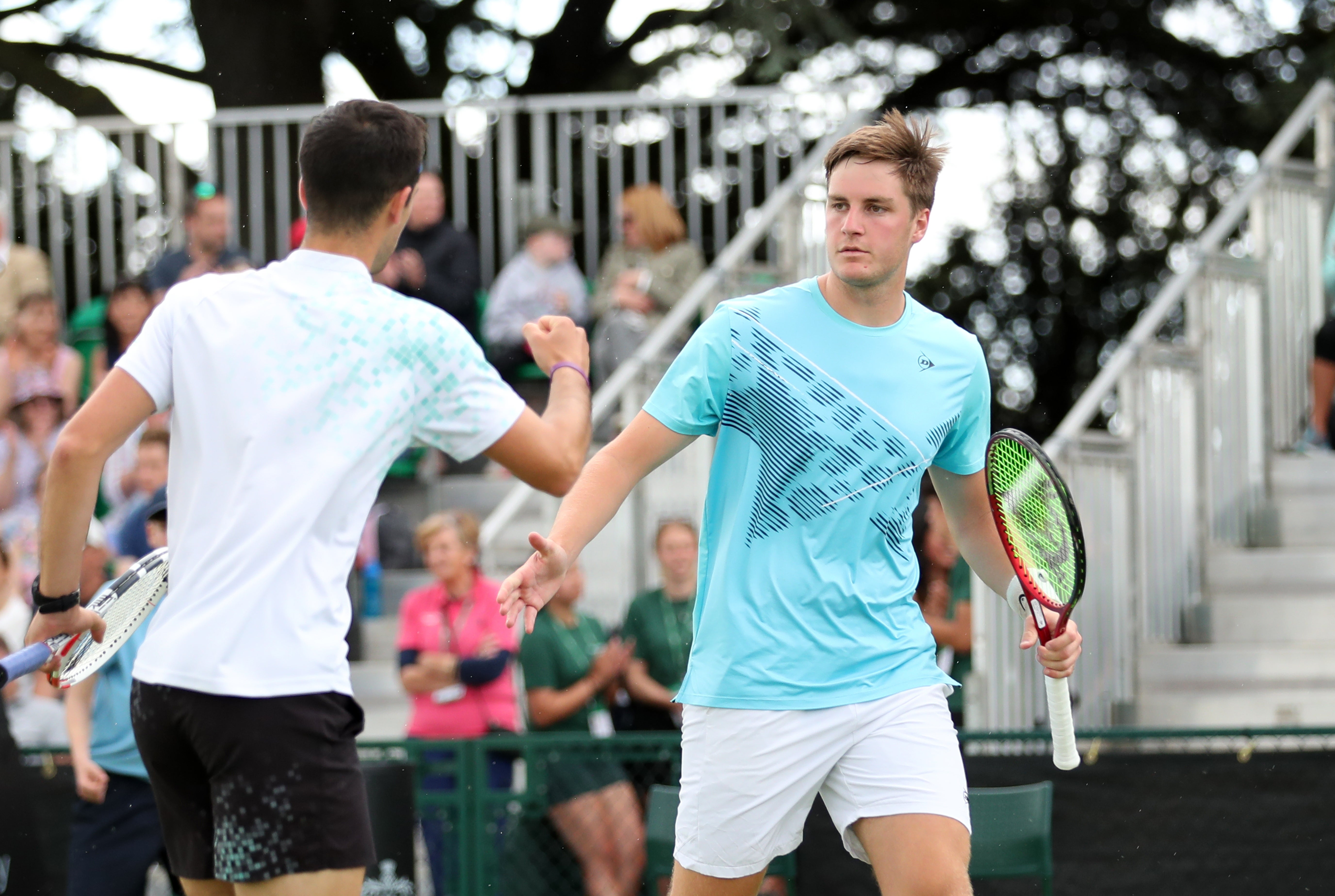 Julian Cash, left, in doubles action with Henry Patten (Isaac Parkin/PA)