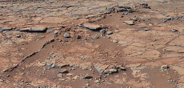 <p>From a position in the shallow “Yellowknife Bay” depression, NASA’s Mars rover Curiosity used its right Mast Camera (Mastcam) to take the telephoto images combined into this panorama of geological diversity</p>