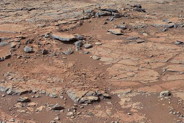 <p>From a position in the shallow “Yellowknife Bay” depression, NASA’s Mars rover Curiosity used its right Mast Camera (Mastcam) to take the telephoto images combined into this panorama of geological diversity</p>