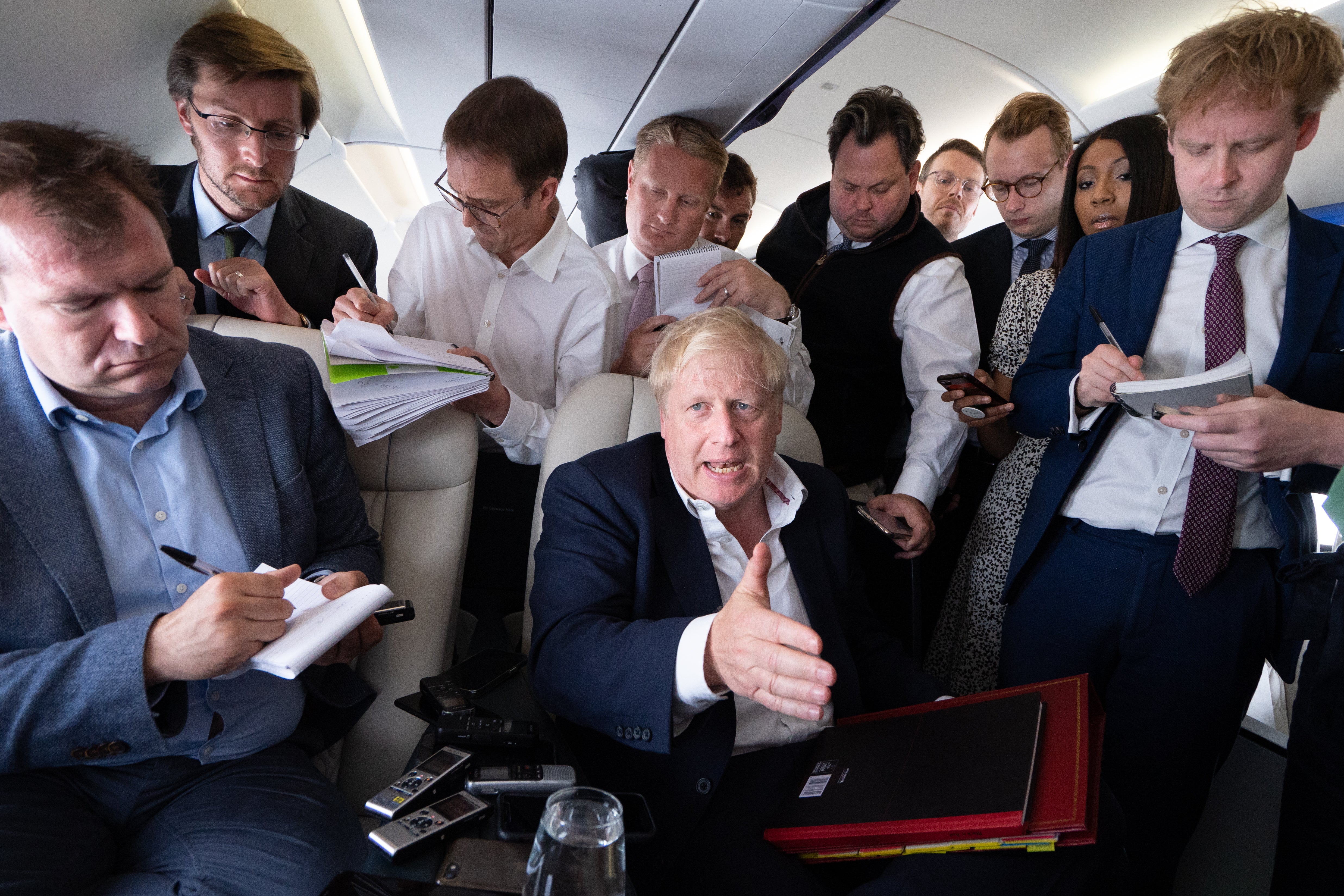 Prime Minister Boris Johnson talks to journalists on his plane during a flight from Germany to the Nato summit in Madrid (Stefan Rousseau/PA)