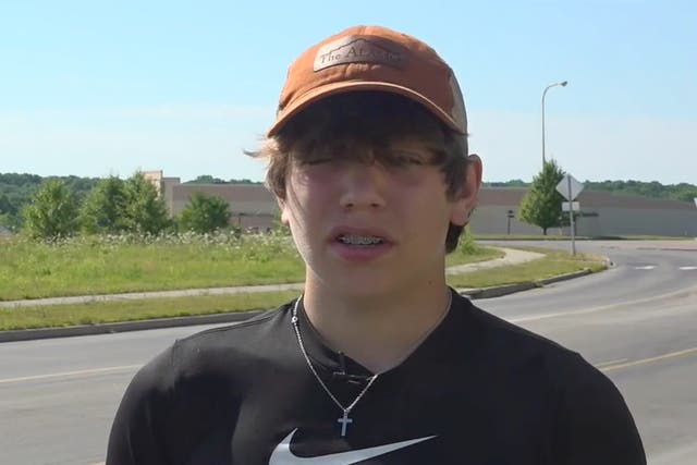 <p>Eli Skrypczak, 15, talking with a local news outlet </p>