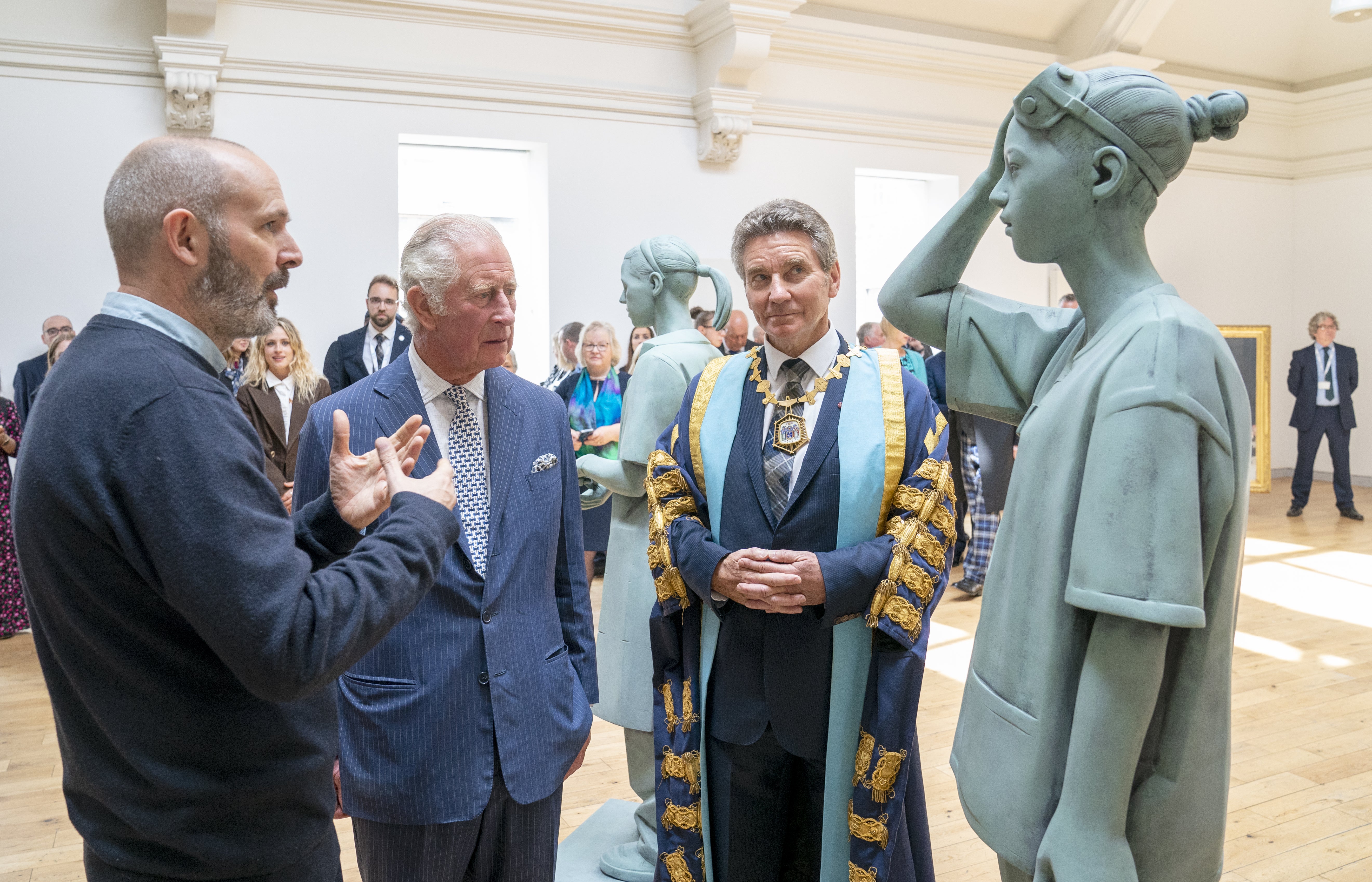 The Prince of Wales, centre, with sculptor Kenny Hunter, left, and Professor Michael Griffin (Jane Barlow/PA)
