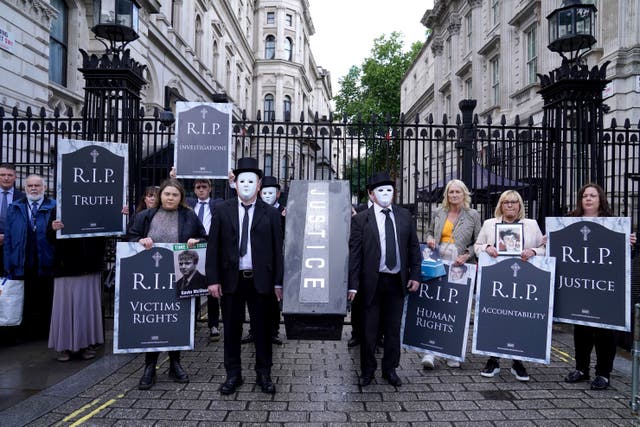 Representatives from Relatives for Justice, whose loved ones were murdered during the Troubles, protest in Parliament Square earlier this year (PA)