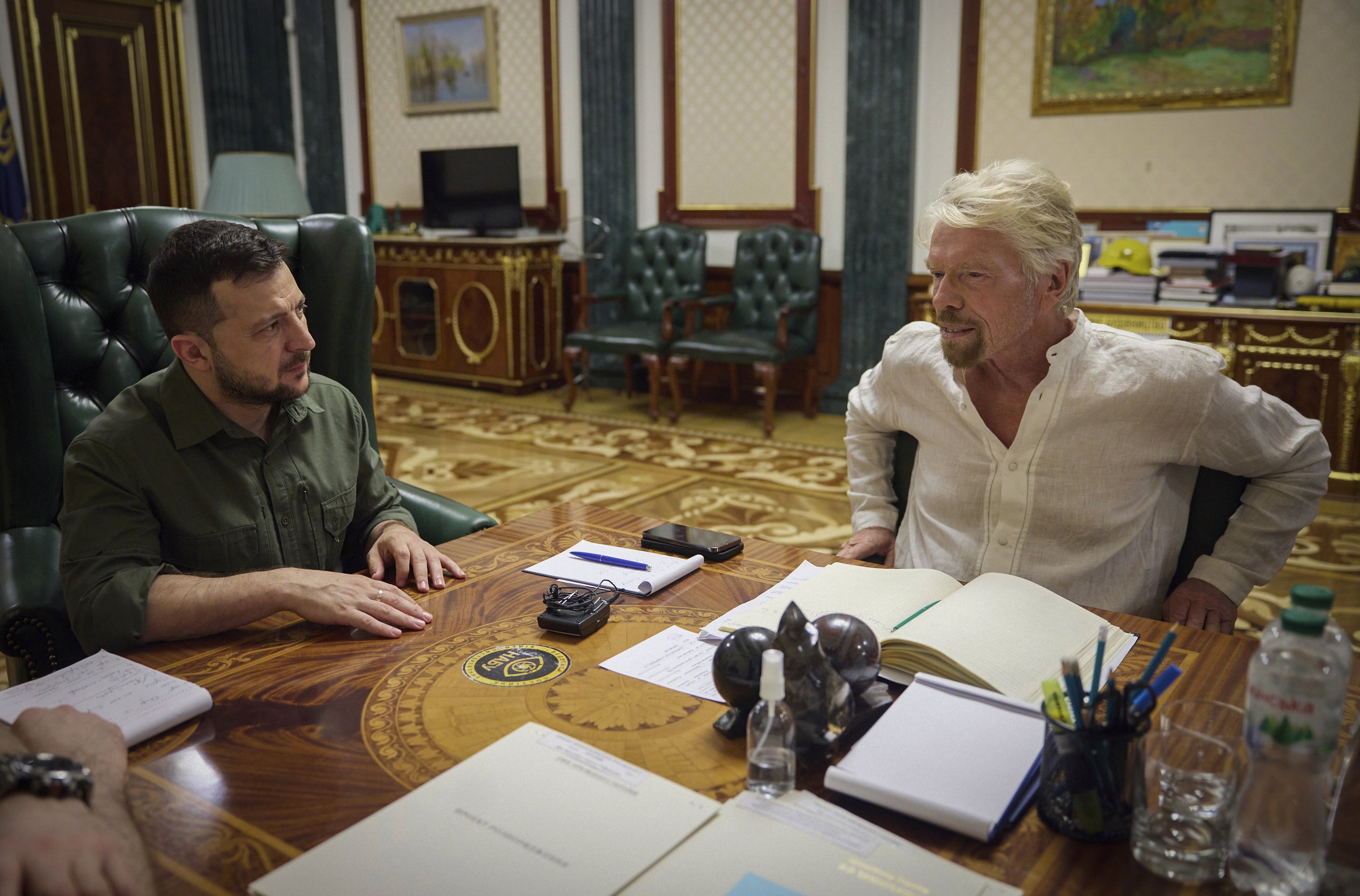 British billionaire Richard Branson has travelled to Ukraine to meet President Volodymyr Zelensky and see some of the devastation wrought by Vladimir ‘Putin’s appalling invasion’ (Ukrainian Presidential Press Office/AP)