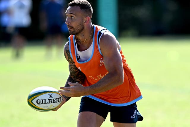 <p>Quade Cooper looks to pass during an Australian Wallabies training session</p>