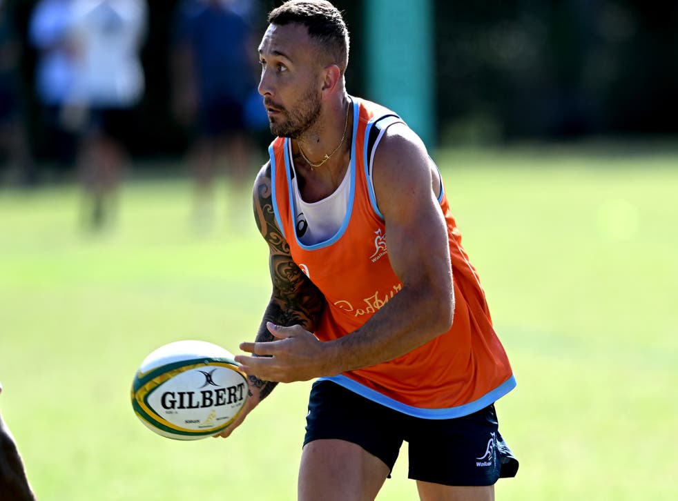 <p>Quade Cooper looks to pass during an Australian Wallabies training session</p>