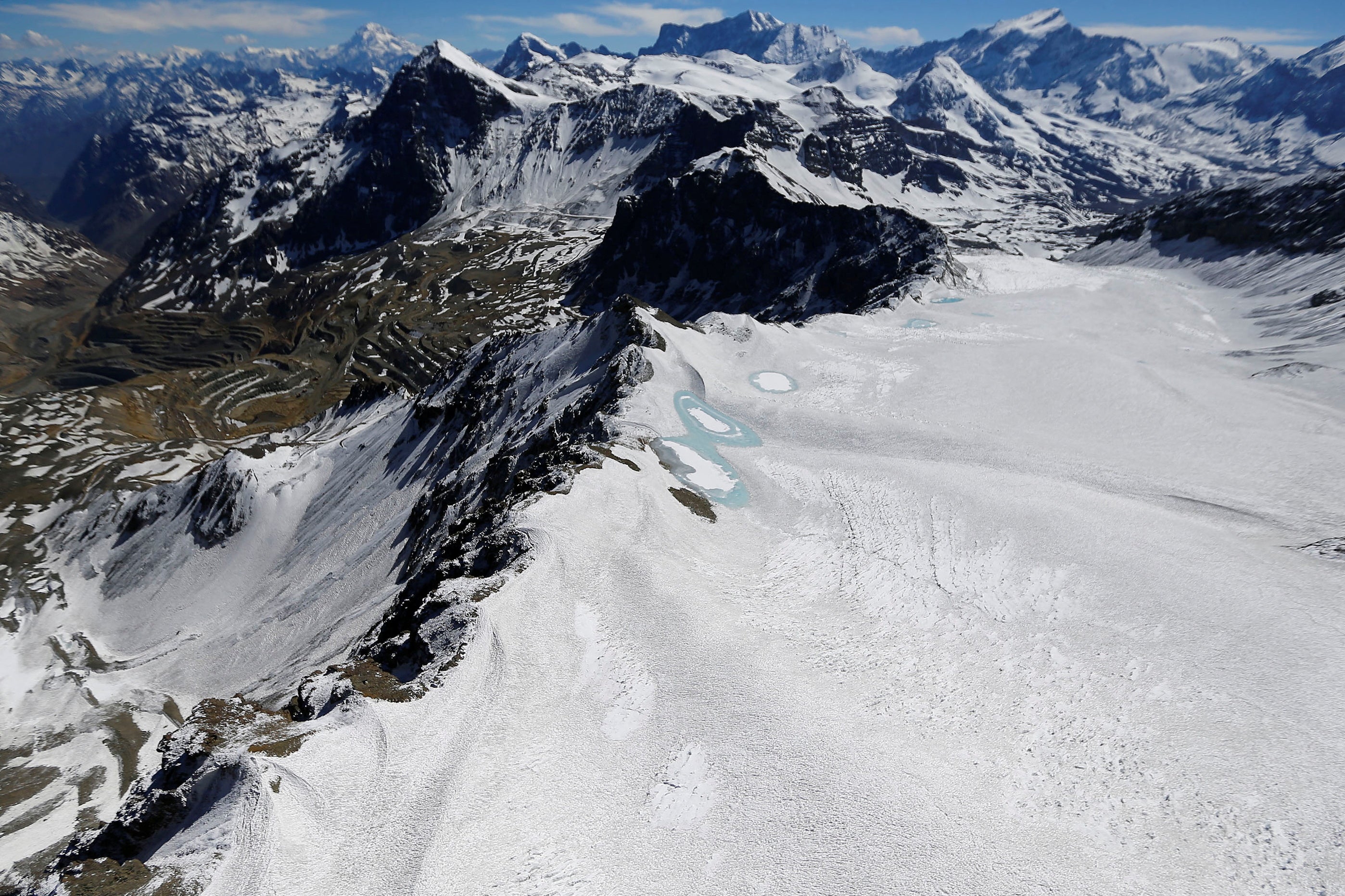 An aerial view of Olivares glacier in the Andes Mountain range