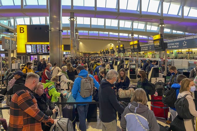 <p>There were long queues at airports during the Easter holidays (Steve Parsons/PA)</p>