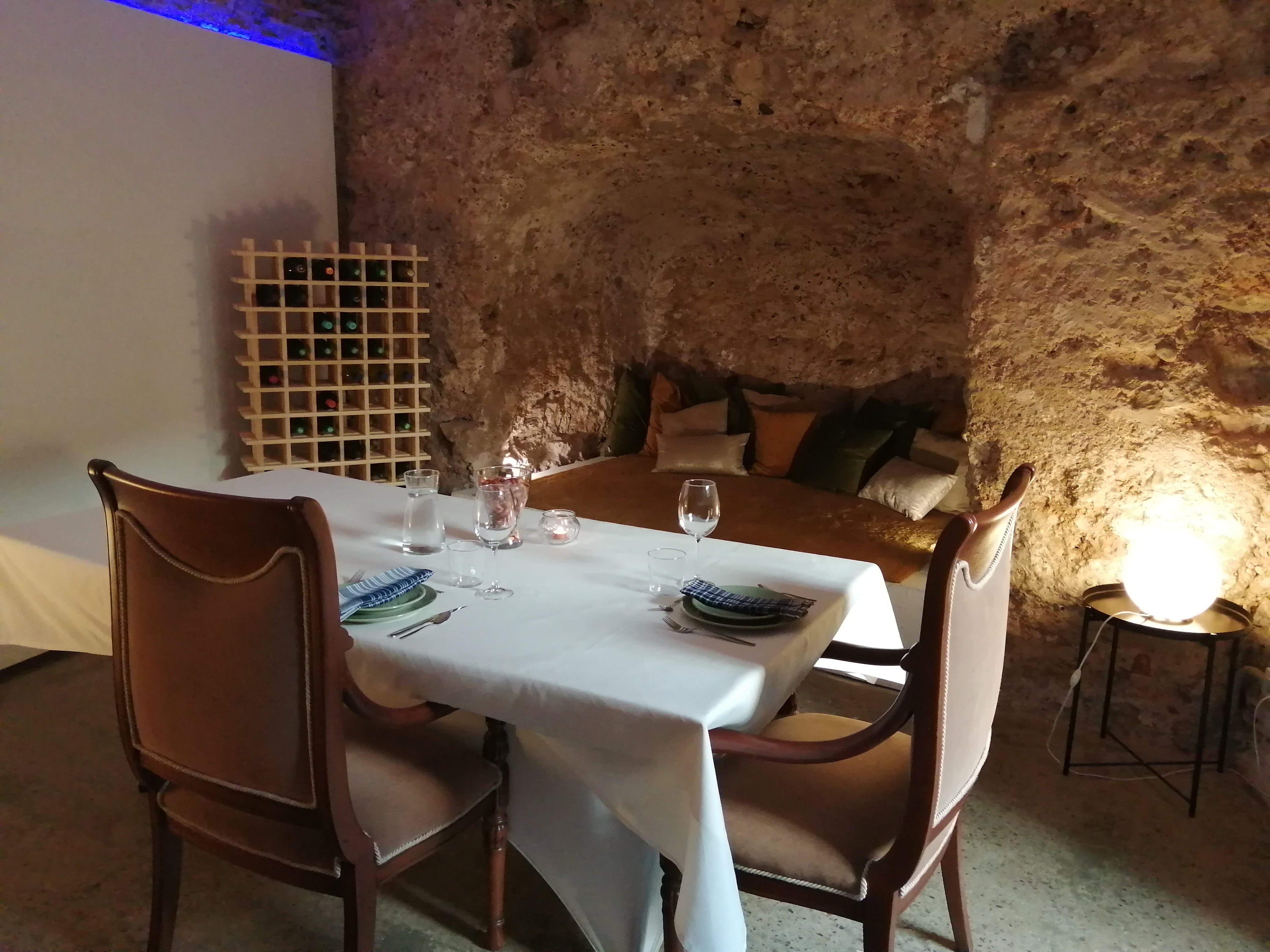 Tasting local tapas inside an 11th-century cave