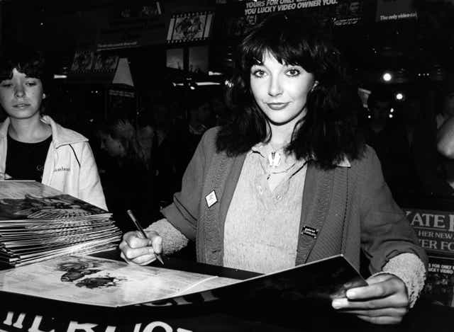 <p>Bush signs copies of her album ‘Never For Ever’ at Virgin Megastore, London, in 1980 </p>