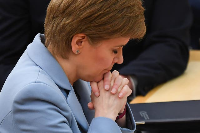 <p>Nicola Sturgeon pauses after giving her statement on independence referendum at the Scottish Parliament in Edinburgh on Tuesday</p>