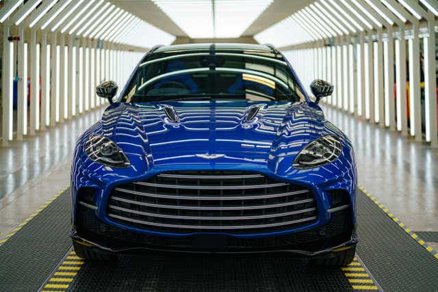 Sports car maker Aston Martin has seen shares slump amid speculation it could sell a stake to raise funds (Ben Birchall/PA)