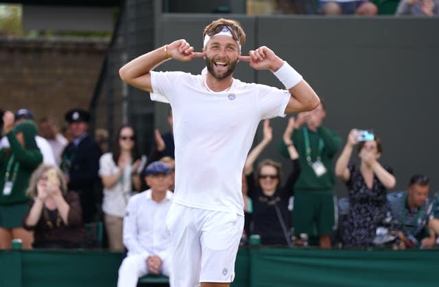 <p>Liam Broady celebrates his victory </p>