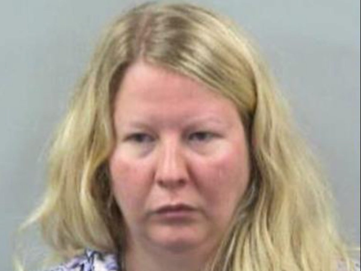 Woman charged with murder after alleging firefighter husband killed himself