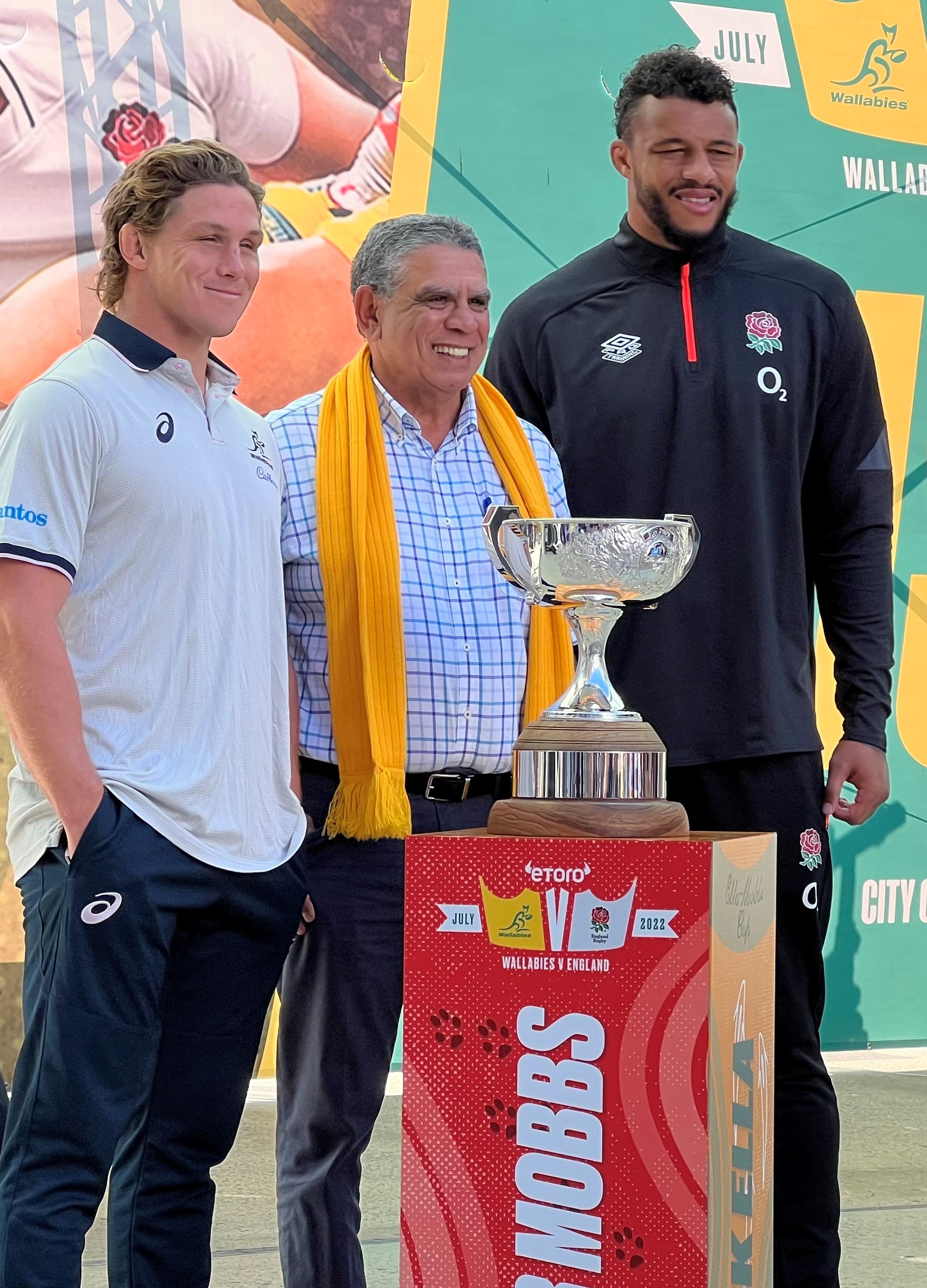 Australia captain Michael Hooper, Mark Ella and Courtney Lawes stand with the Ella-Mobbs Cup at its unveiling in Perth (PA)