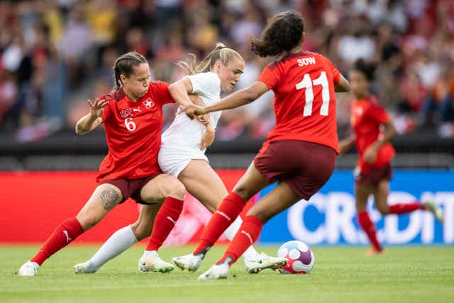 England’s Georgia Stanway (centre) in action against Switzerland on Thursday (Ennio Leanza/AP)