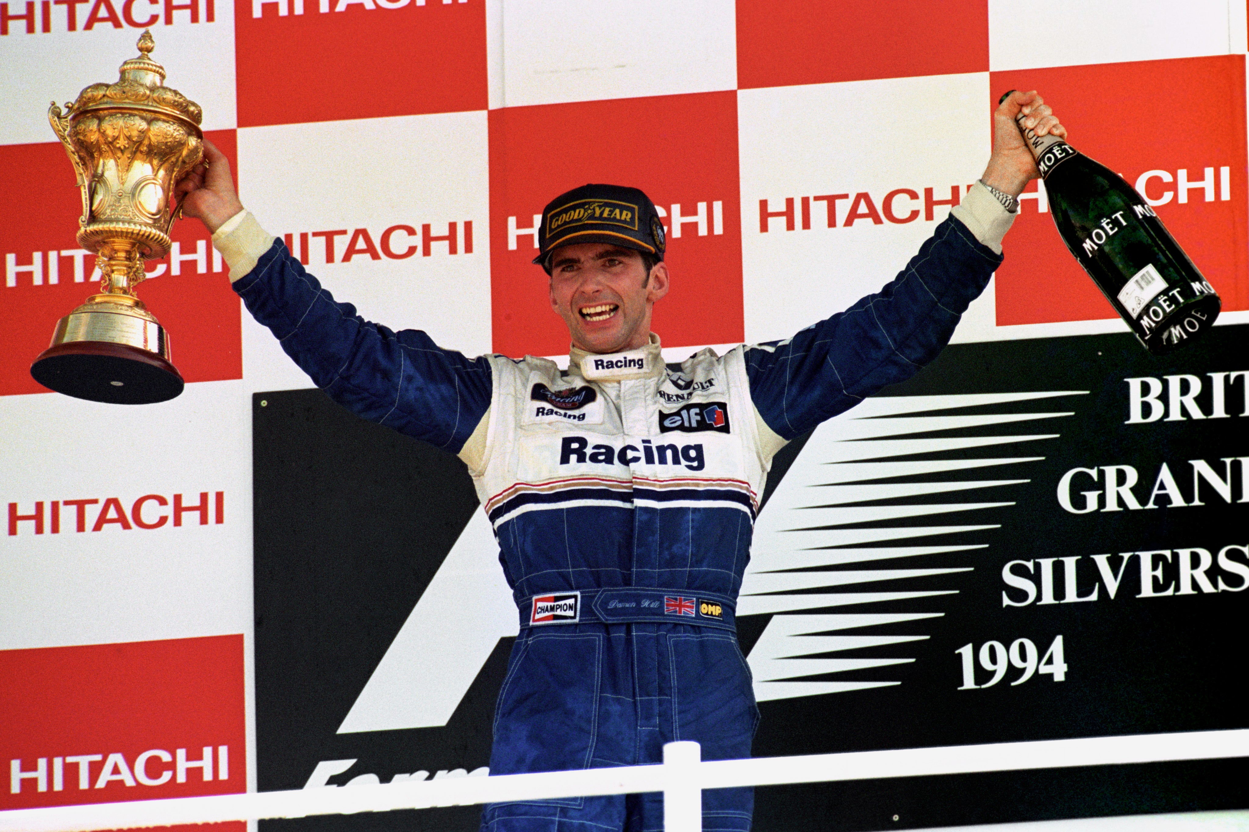 Damon Hill celebrates after winning a controversial British GP (PA Archive)