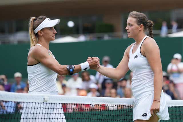 Ukraine’s Lesia Tsurenko congratulates Jule Niemeier after their third-round match at Wimbledon (Alberto Pezzali/AP/PA)