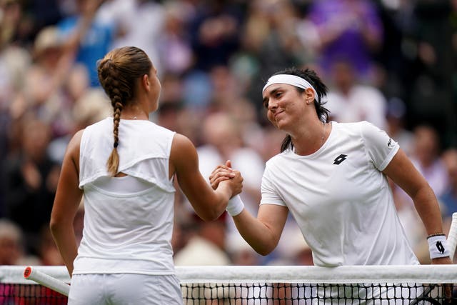 Ons Jabeur shakes hands with Diane Parry (left) after winning in the Wimbledon third round (Adam Davy/PA)
