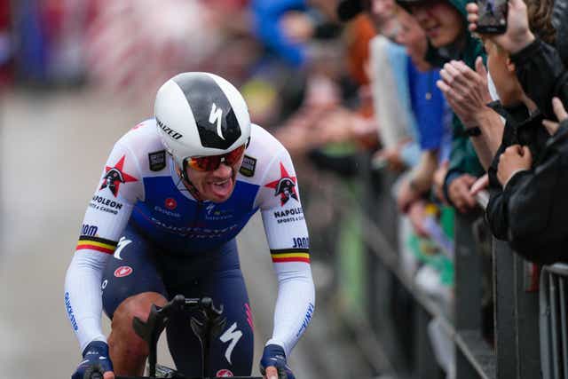 Belgium’s Yves Lampaert won a wet opening time trial in the Tour de France (Daniel Cole/AP)