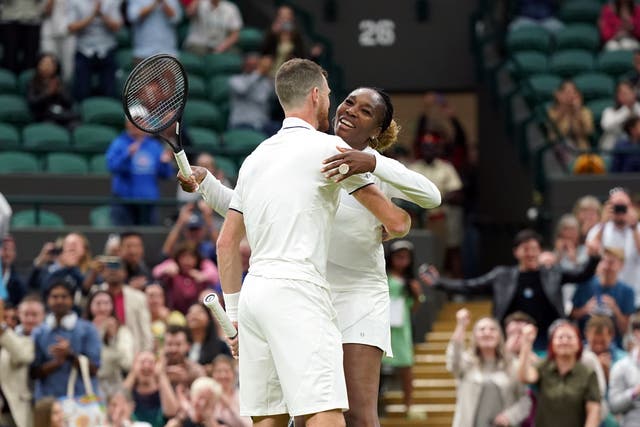 Jamie Murray and Venus Williams celebrate victory (Zac Goodwin/PA)