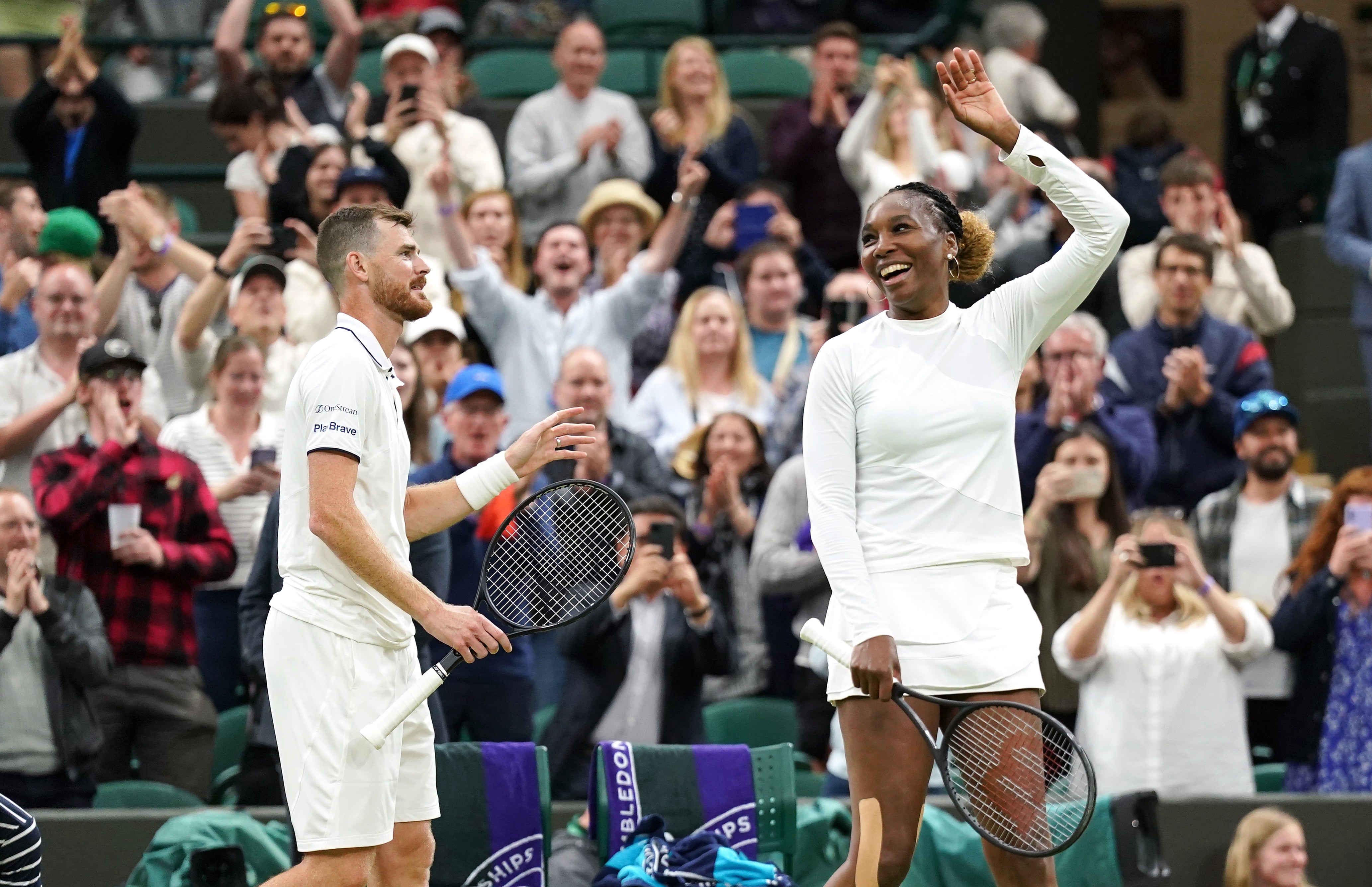 Jamie Murray and Venus Williams celebrate victory in the mixed doubles at Wimbledon (Zac Goodwin/PA)