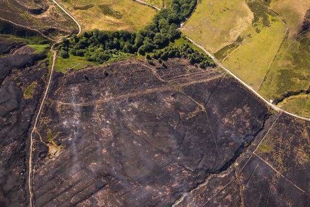 Fire damage from the Smithills fire seen from above (Joel Goodman/WTML/PA)