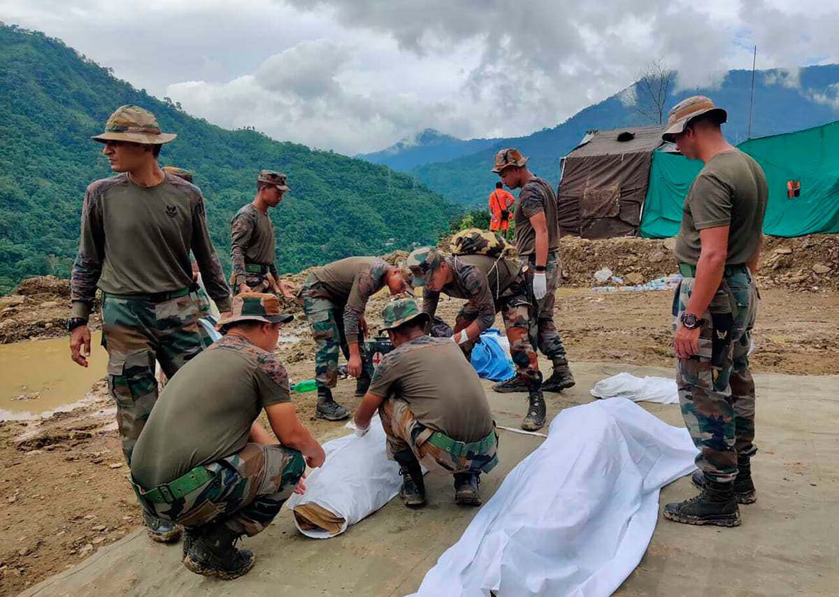 Rescuers recover 26 dead from mudslide in India's northeast