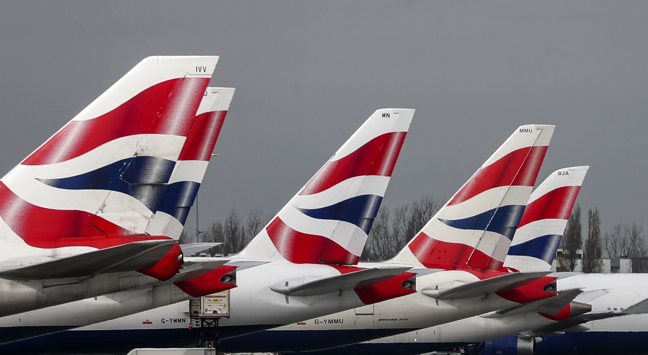 British Airways planes at London Heathrow, where passenger service agents have voted to strike