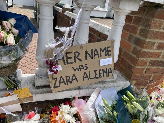 <p>Floral tributes left on Cranbrook Road in east London, where Aleena was killed </p>