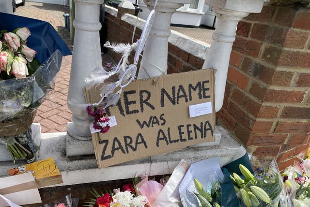 <p>Floral tributes left on Cranbrook Road in east London, where Aleena was killed </p>