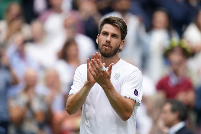 Cameron Norrie applauds the fans after winning his third round match against Steve Johnson (Adam Davy/PA)