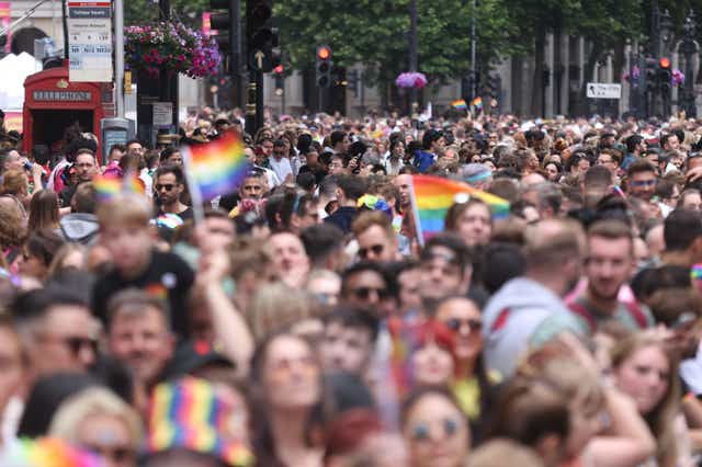 People take part in the Pride in London parade in Trafalgar Square (James Manning/PA)