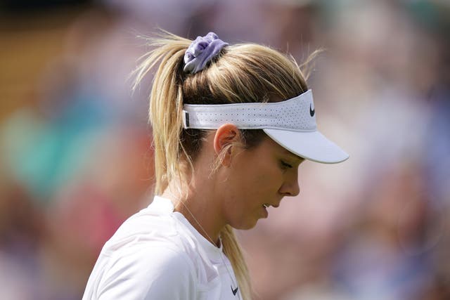 Katie Boulter dejected in her match against Harmony Tan (PA)