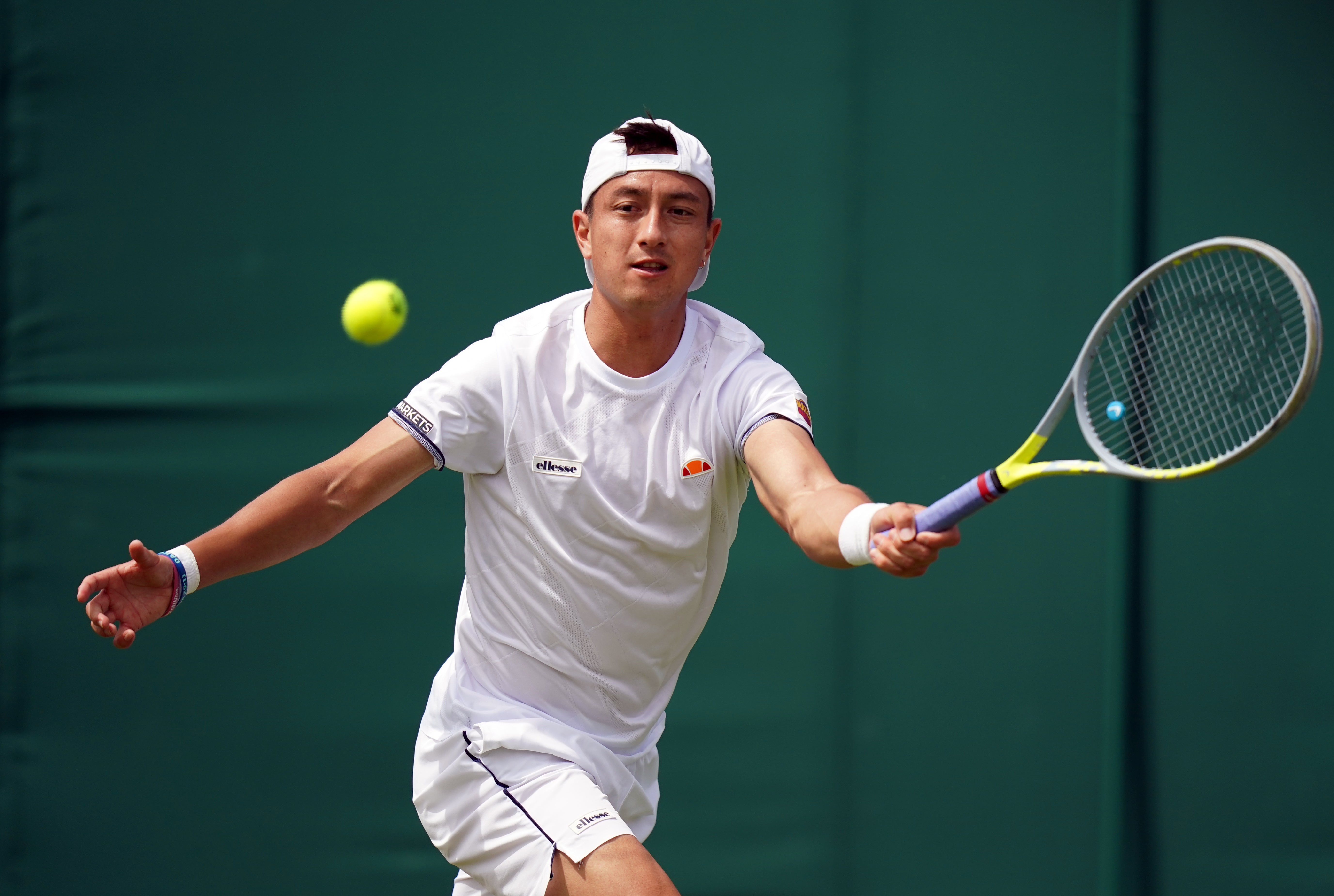 Ryan Peniston in action against Steve Johnson on day three of the 2022 Wimbledon Championships at the All England Lawn Tennis and Croquet Club, Wimbledon. Picture date: Wednesday June 29, 2022.