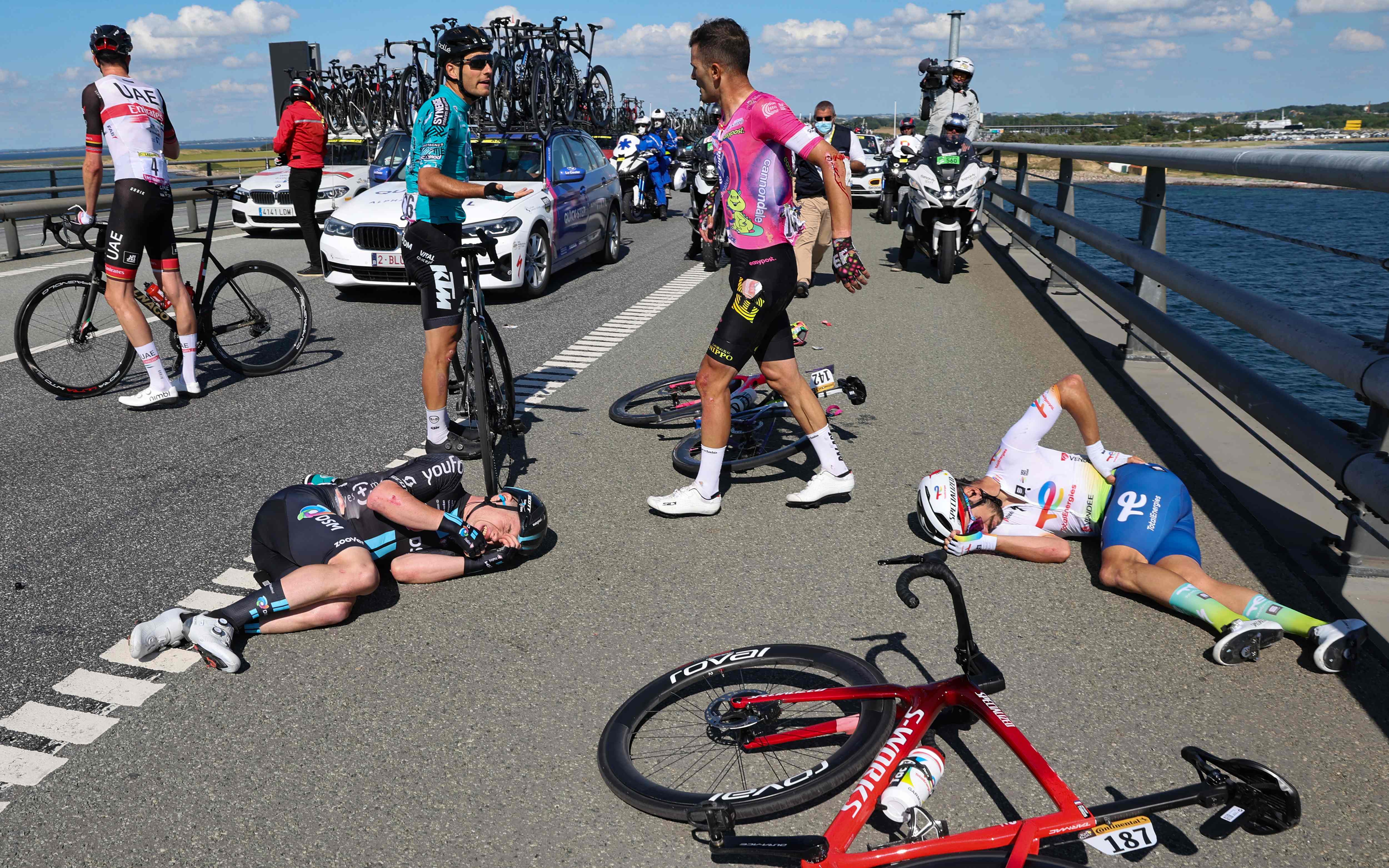 Riders suffer a crash on the Great Belt Fixed Link bridge (Storebaelt) during Saturday’s 2nd stage