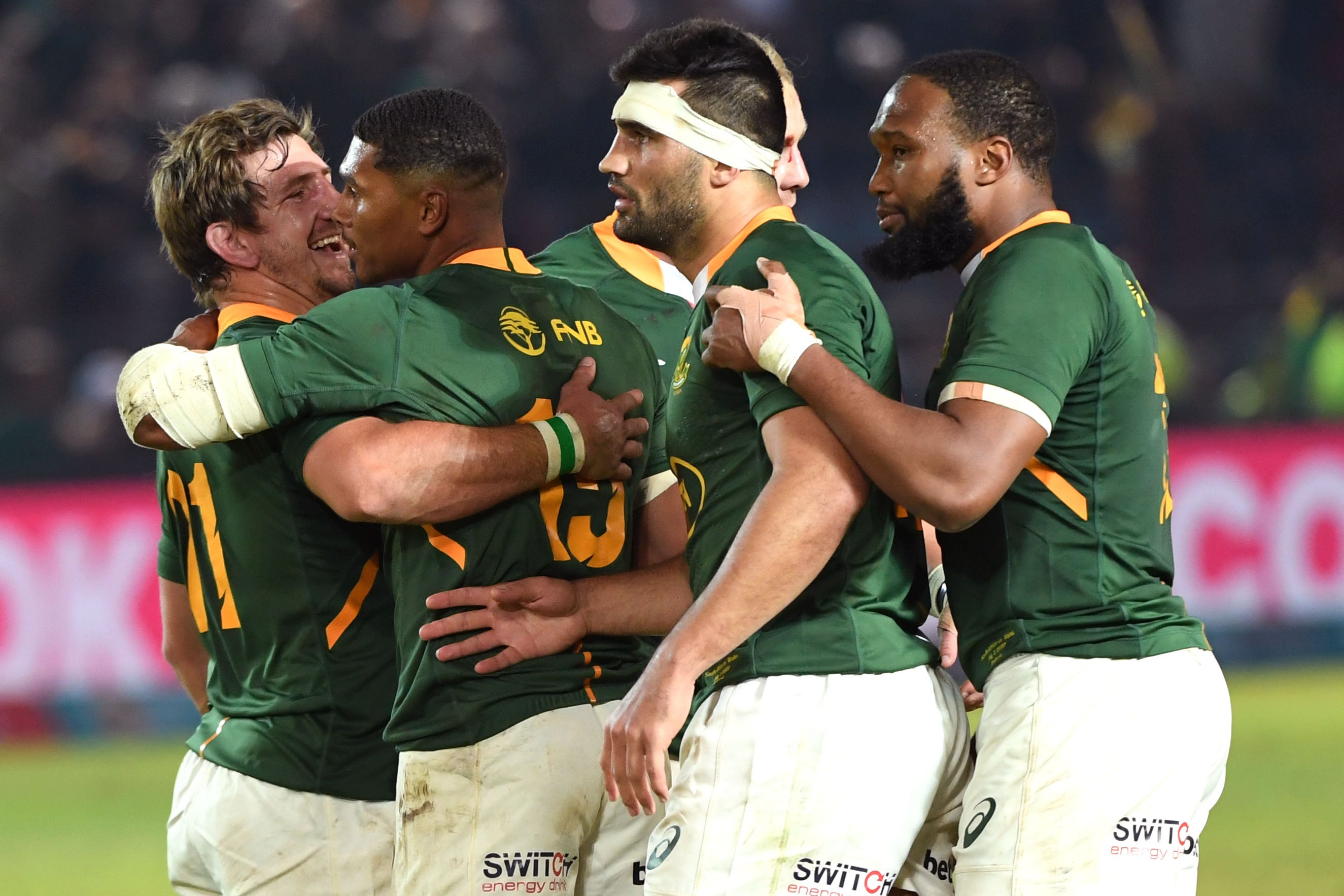 Kwagga Smith (left) hugs match-winner Damian Willemse after the first test match between South Africa and Wales at Loftus Versfeld on 2 July 2022 in Pretoria