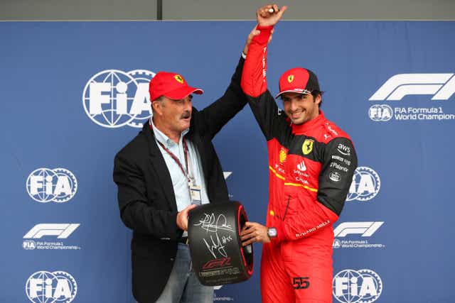 Carlos Sainz was presented his pole position award by Nigel Mansell (Bradley Collyer/PA)