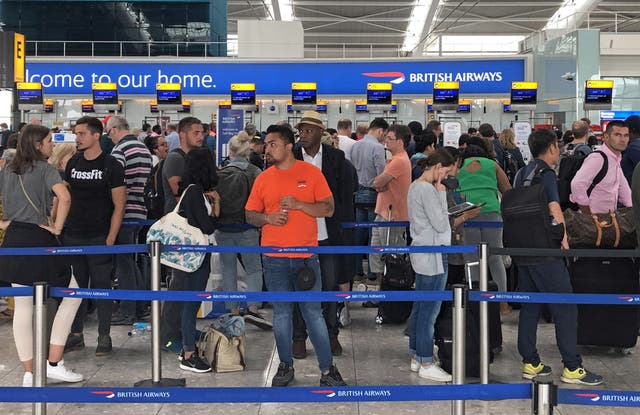 <p>Queues in Terminal 5 at Heathrow airport (Steve Parsons/PA)</p>