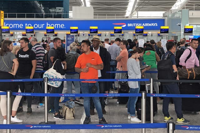 <p>Queues in Terminal 5 at Heathrow airport (Steve Parsons/PA)</p>