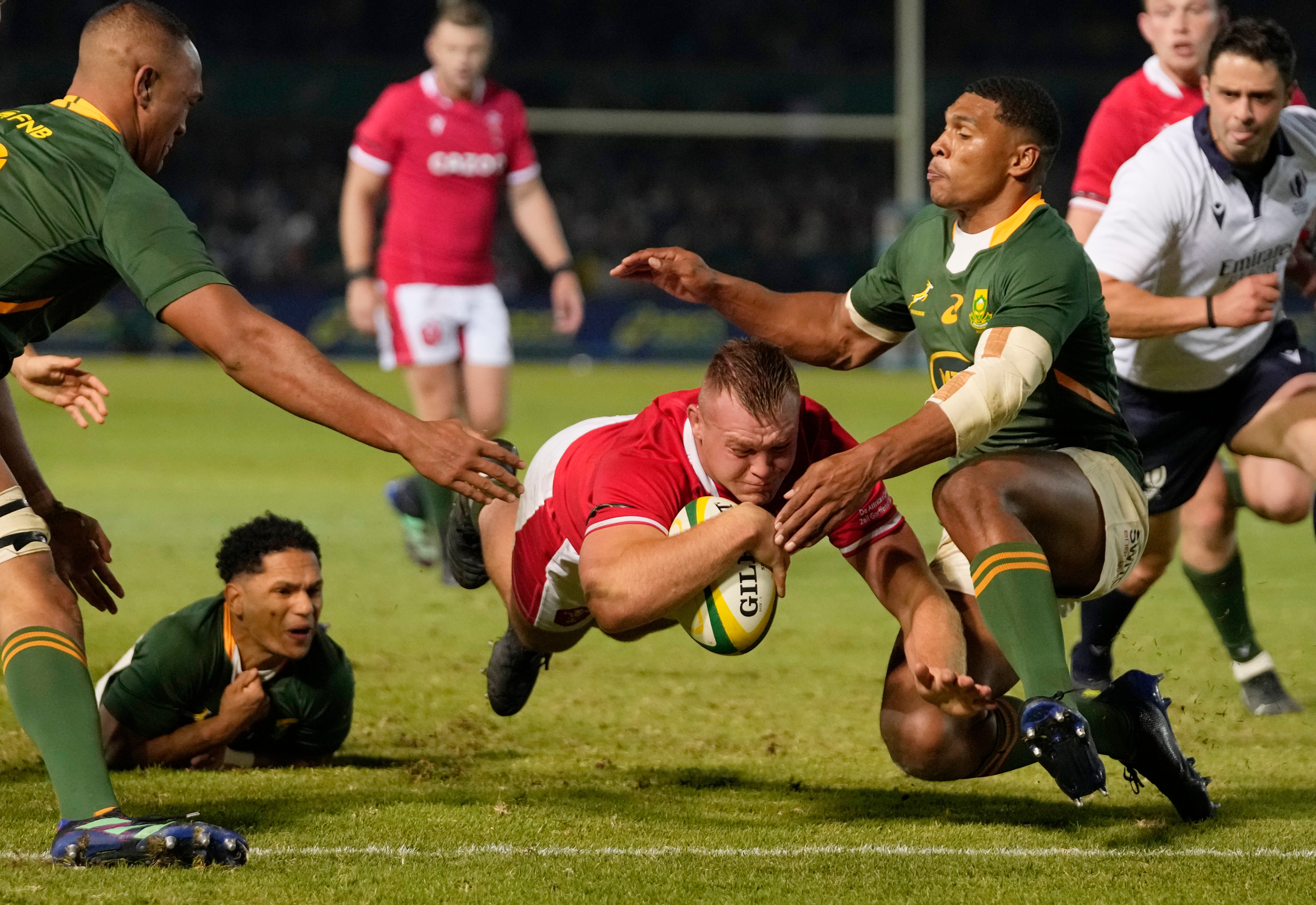 Dewi Lake dives to score a try for Wales against South Africa in Pretoria (Themba Hadebe/AP)