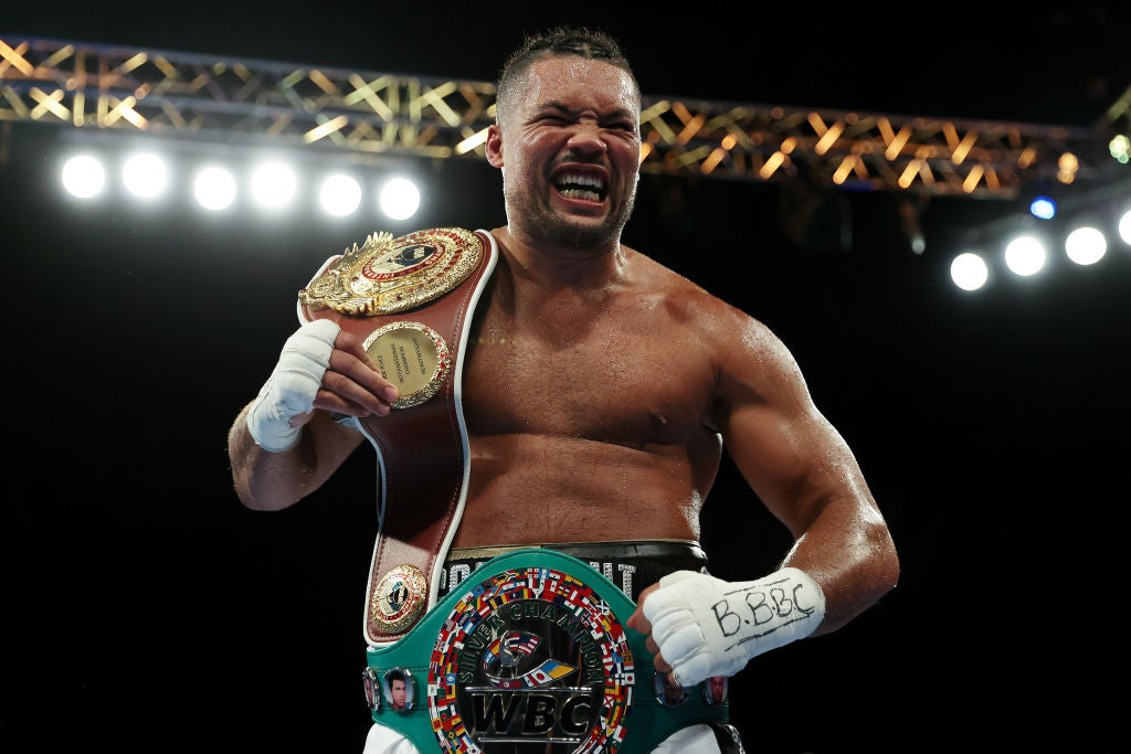 Joe Joyce celebrates with the WBO International Heavyweight belt after defeating Christian Hammer at OVO Arena Wembley on Saturday