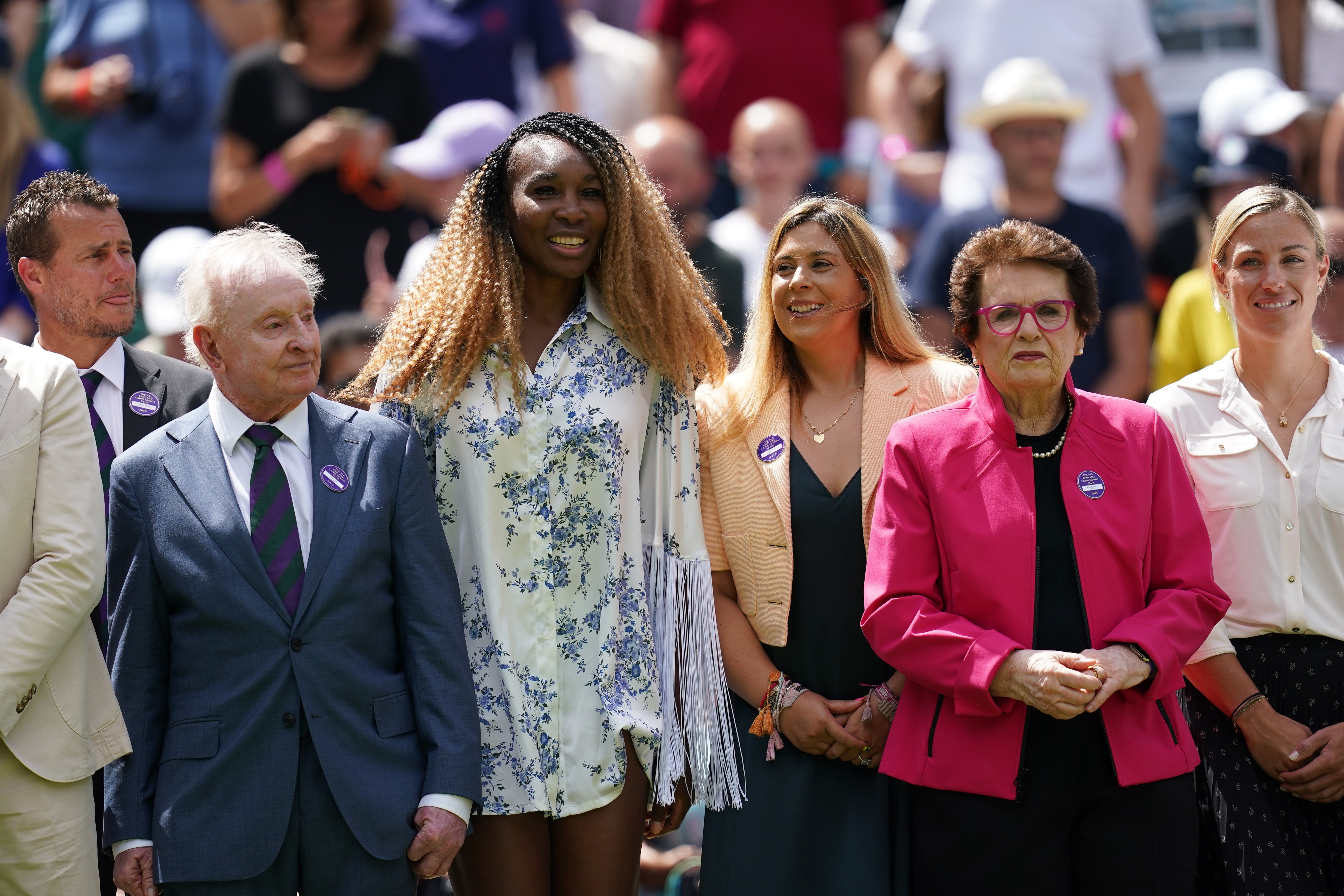 Former Wimbledon champions including Rod Laver, Venus Williams and Billie Jean King line up on Centre Court (John Walton/PA)