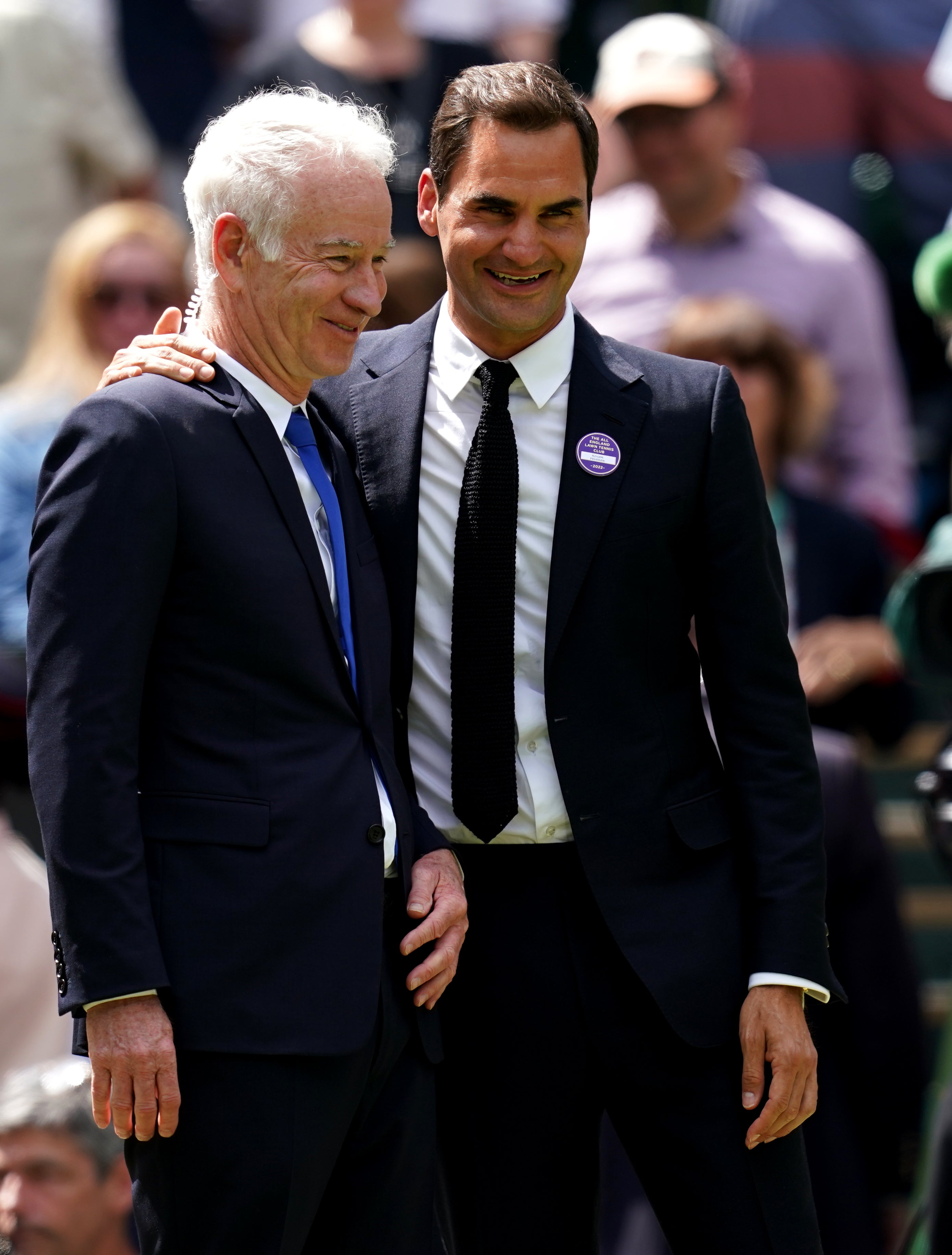 Former Wimbledon champions John McEnroe (left) and Roger Federer (John Walton/PA)